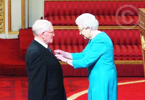 Award MBE by HM Queen Elizabeth